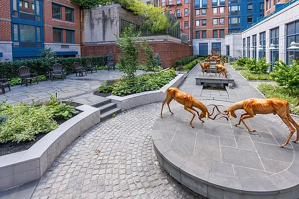 404 East 76th Street, Unit 30C Manhattan, NY 10021 - Photo 20 of 24 a view of a swimming pool with a patio