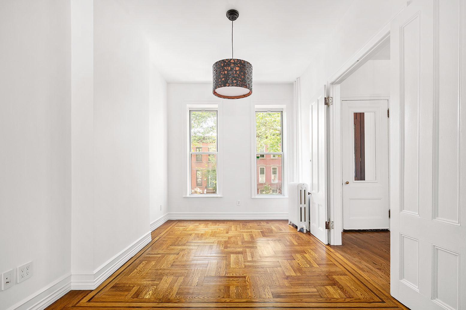 428 5th Street Brooklyn, NY 11215 - Photo 2 of 26 a view of an empty room with window and bathroom