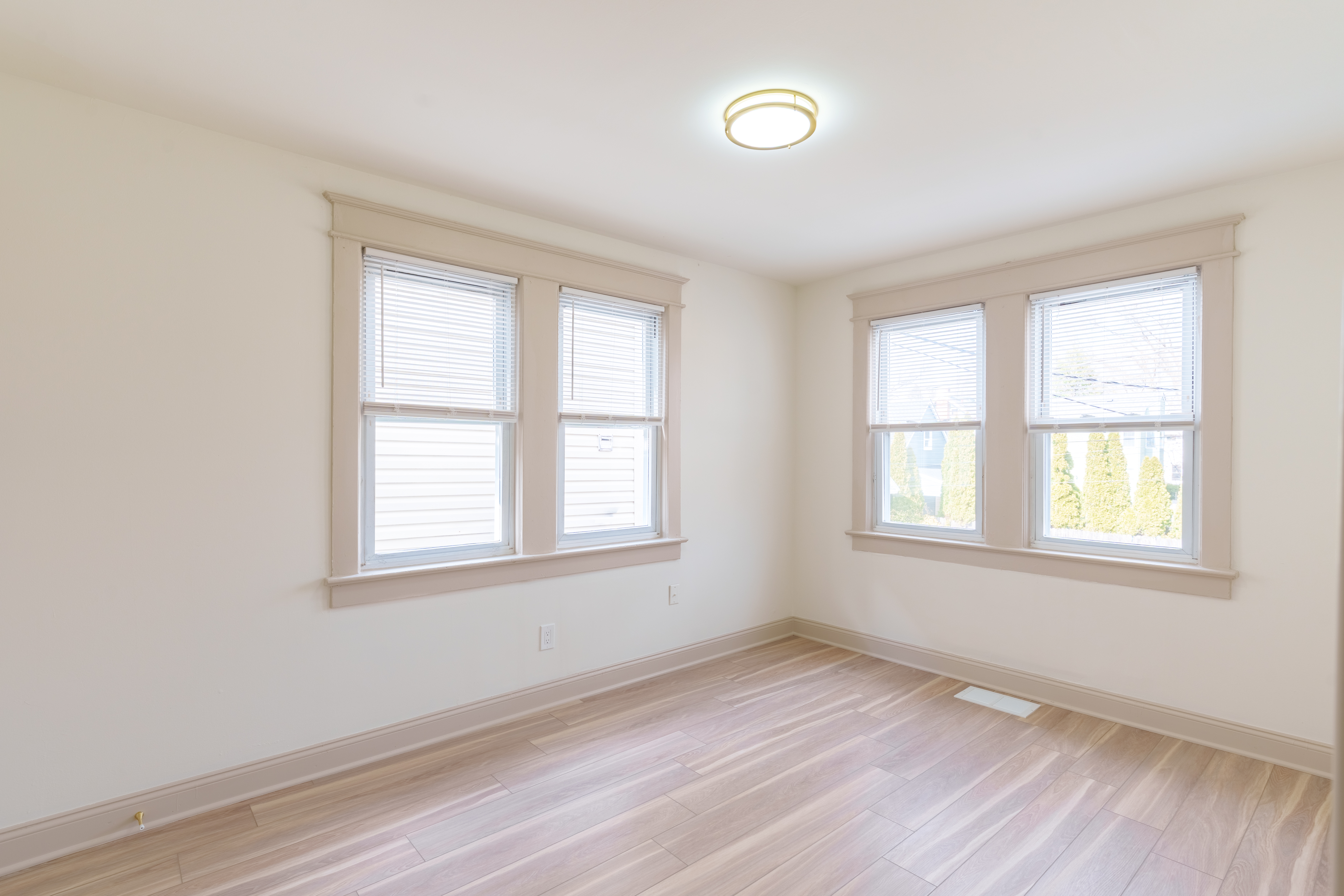 415 North Haddon Avenue Haddonfield, NJ 08033 - Photo 11 of 23 an empty room with wooden floor and windows
