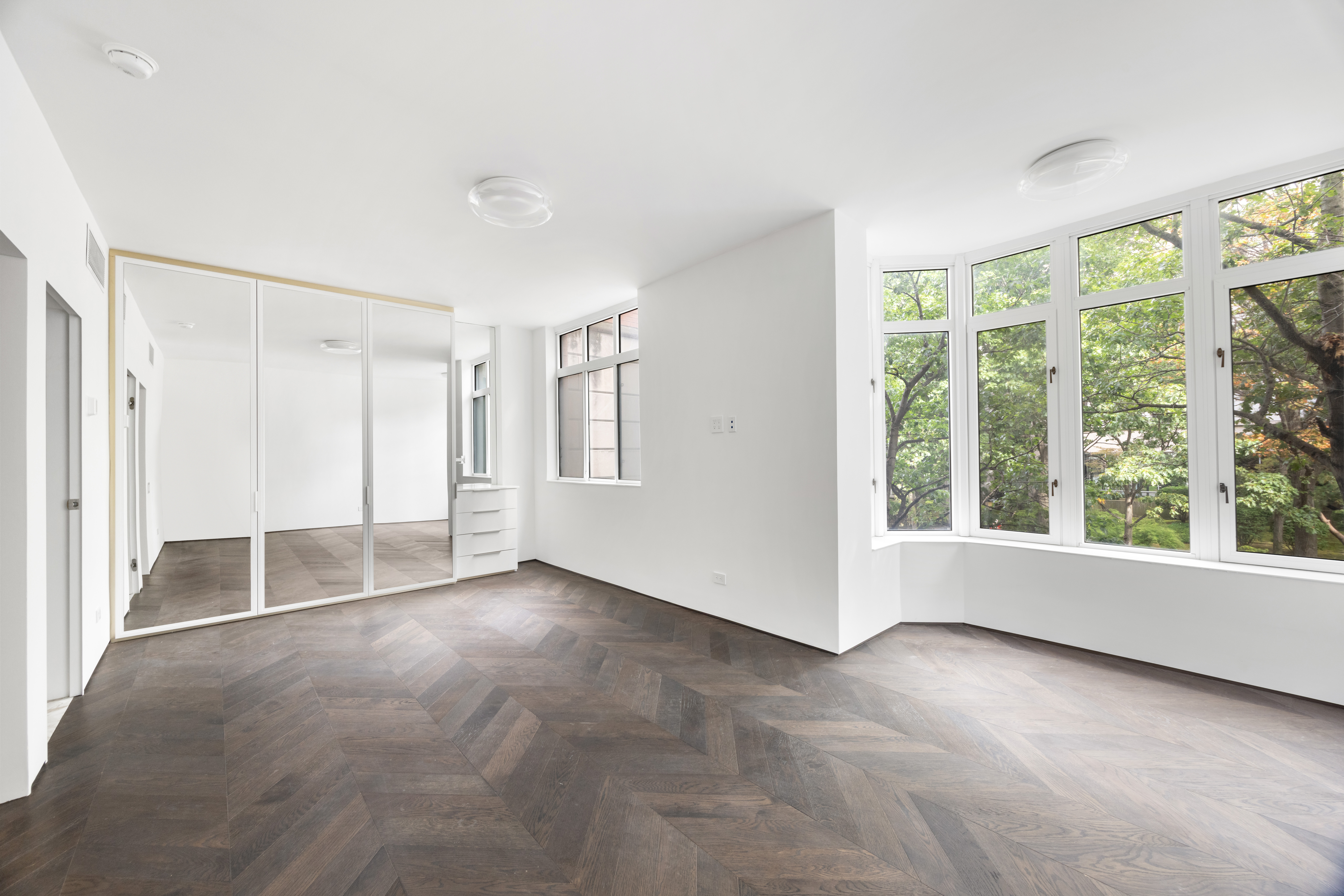 340 Albany Street Manhattan, NY 10280 - Photo 10 of 24 a view of an empty room with a window