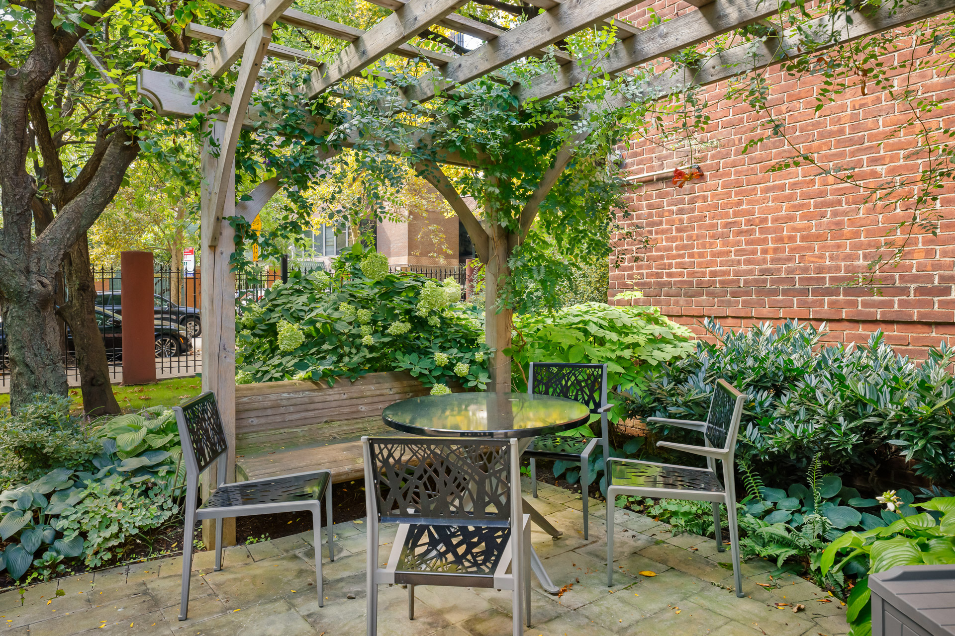 175 Willoughby Street, Unit 6K Brooklyn, NY 11201 - Photo 13 of 14 a view of an chairs and table in the garden