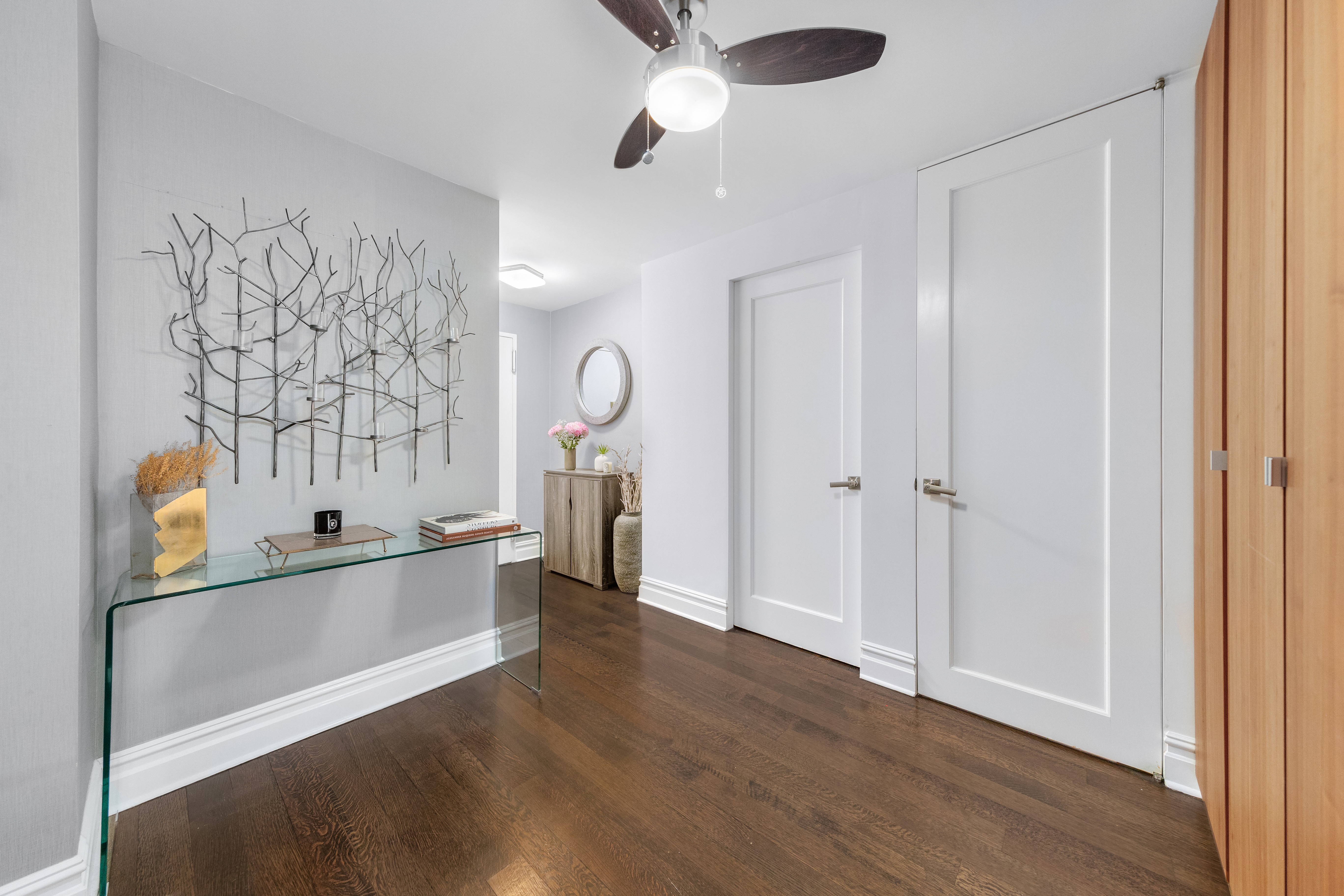 305 East 40th Street, Unit 5K Manhattan, NY 10016 - Photo 10 of 15 a view of a hallway with wooden floor