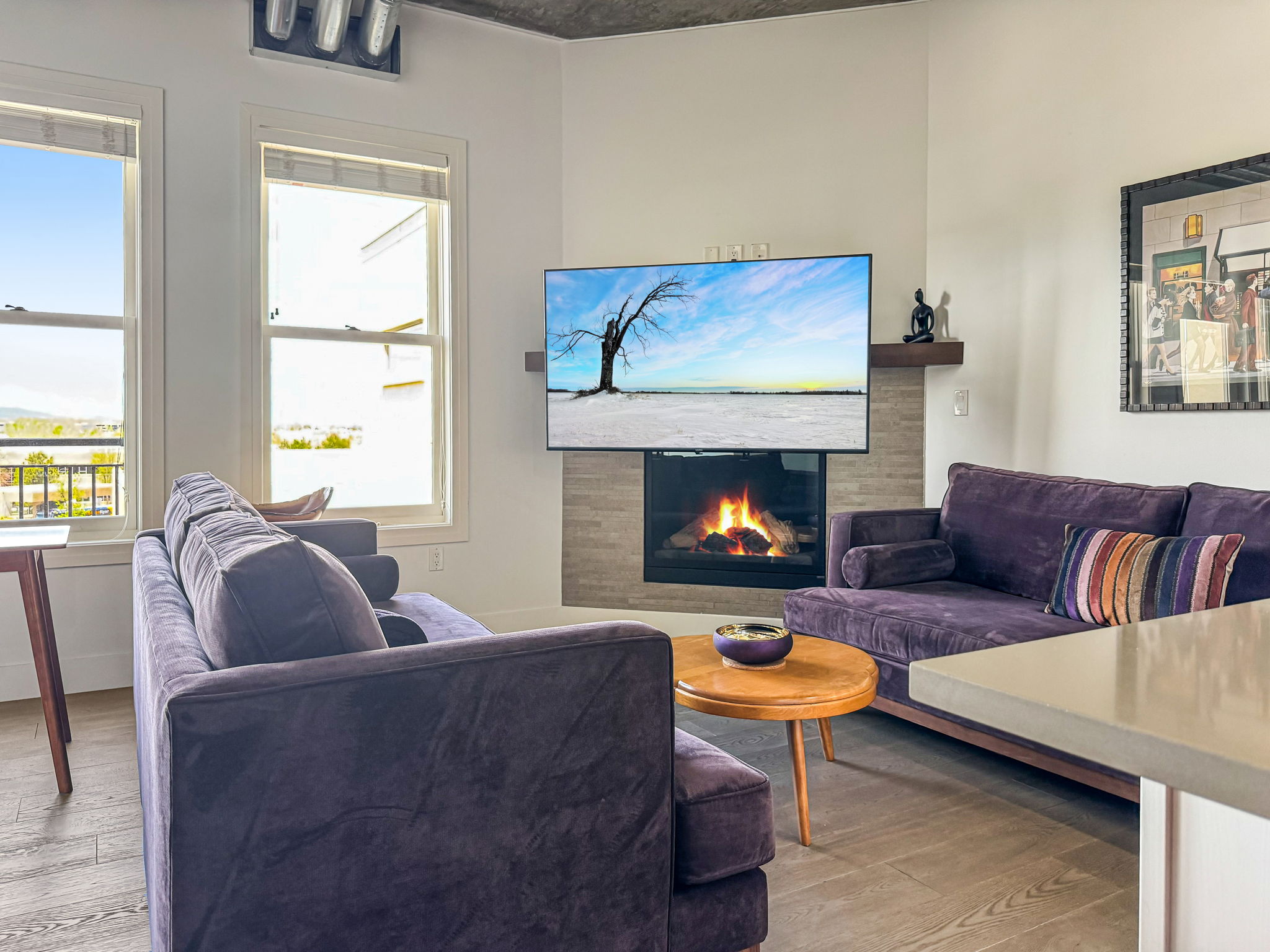 3401 Arapahoe Avenue, Unit Undisclosed Boulder, CO 80303 - Photo 5 of 28 a living room with furniture and a fireplace