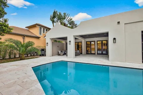 a view of a house with a swimming pool