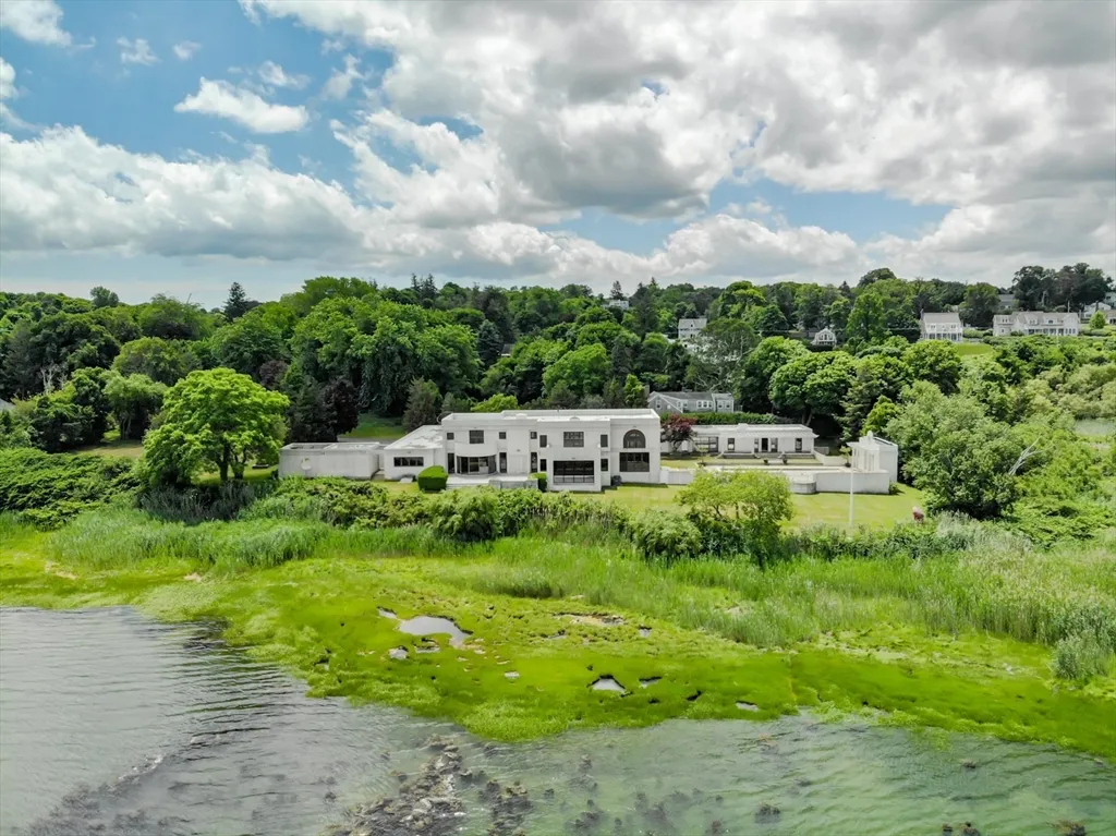 a view of a garden with lawn chairs