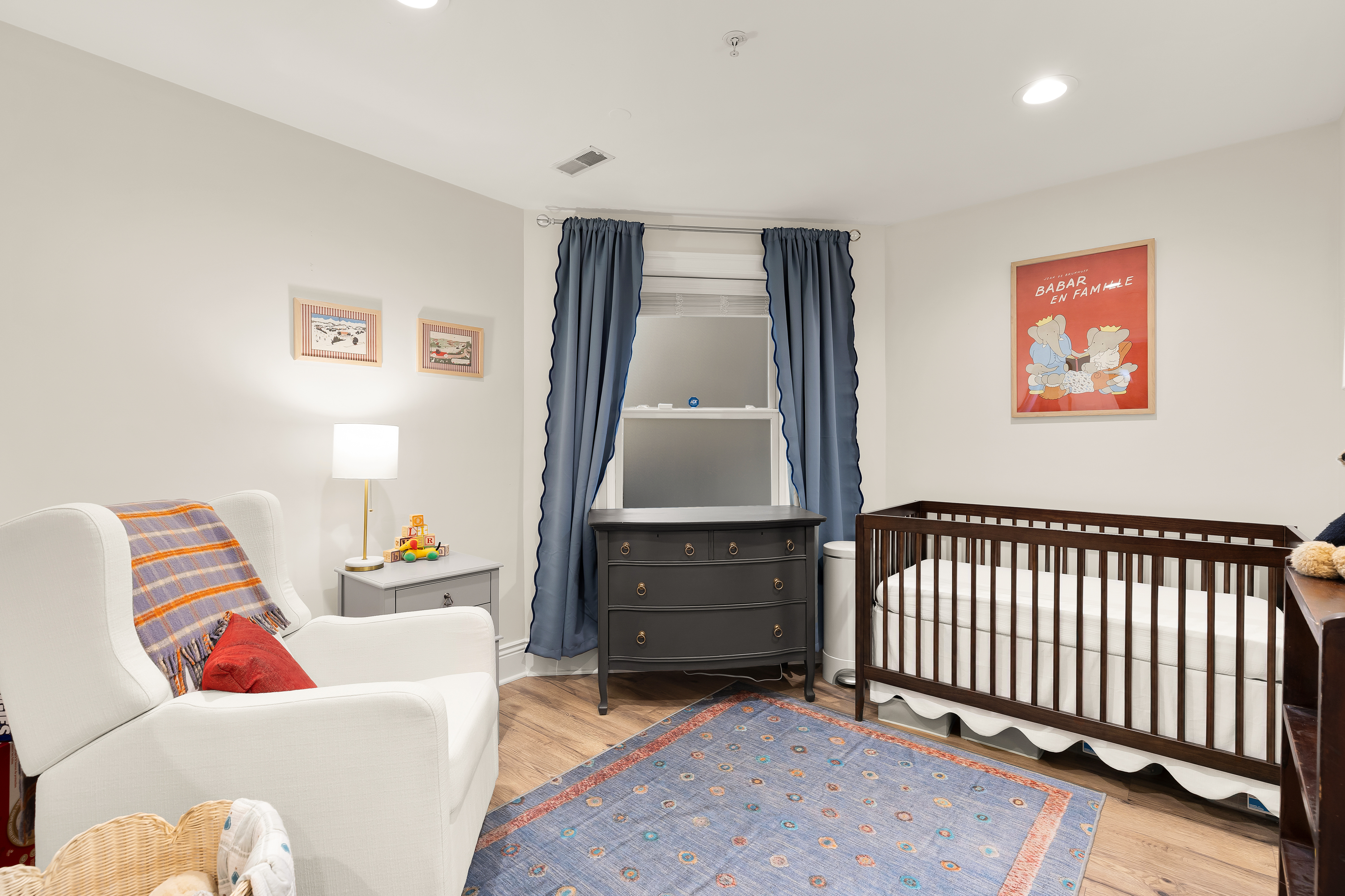 1354 Kenyon Street Northwest, Unit G Washington, DC 20010 - Photo 22 of 35 a living room with furniture and a window