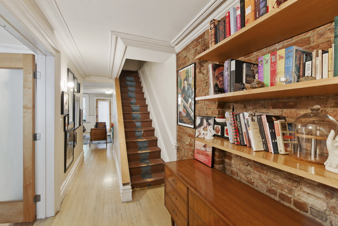 304 Lafayette Avenue, Unit GARDEN Brooklyn, NY 11238 - Photo 9 of 10 a view of an entryway with wooden floor and stairs