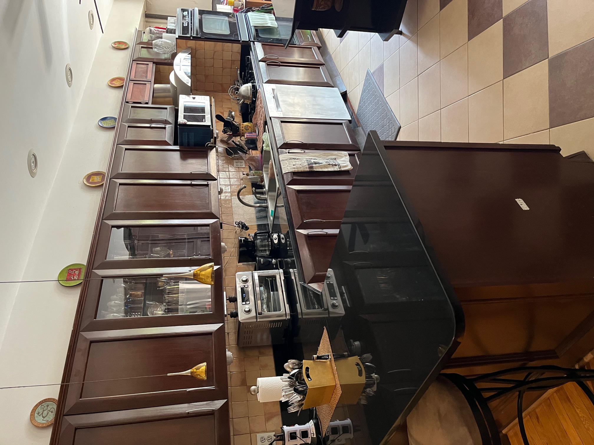 106 West 131st Street Manhattan, NY 10027 - Photo 6 of 16 a kitchen with stainless steel appliances granite countertop a sink a stove and cabinets