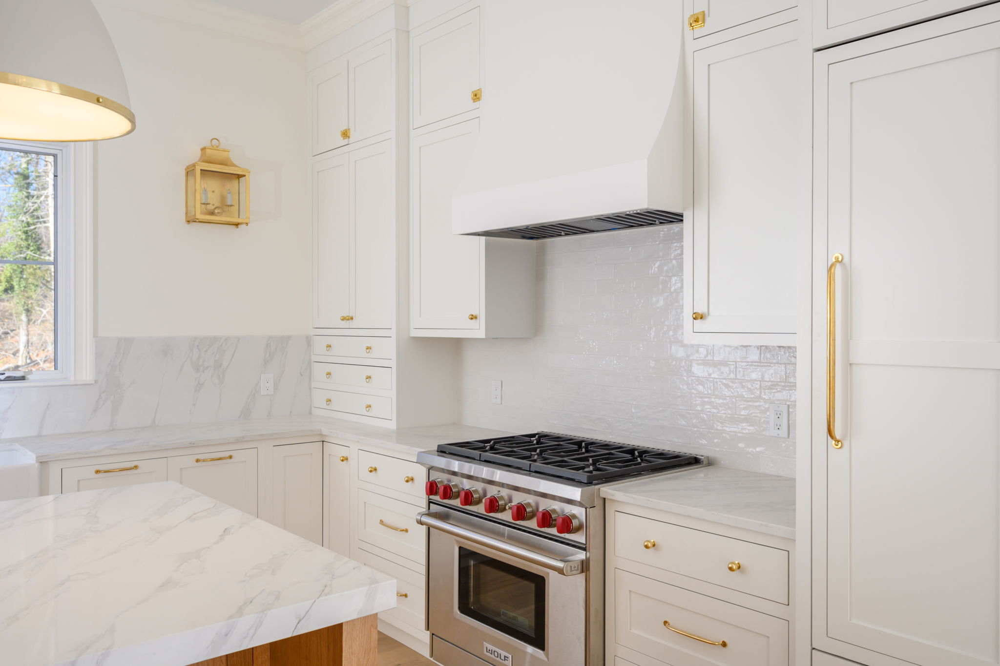 249 Central Avenue Milton, MA 02186 - Photo 12 of 61 a kitchen with a stove and a sink