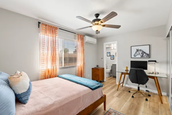 a bathroom with a toilet a sink and bathtub