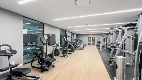 a view of a room with gym equipment