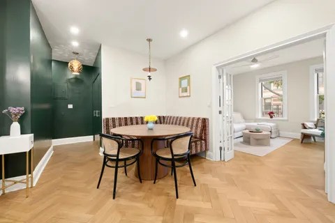 a view of a dining room with furniture