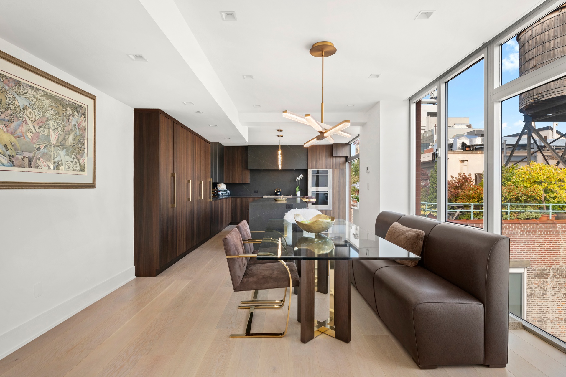 151 West 17th Street, Unit PHF Manhattan, NY 10011 - Photo 7 of 19 a dining room with furniture and window