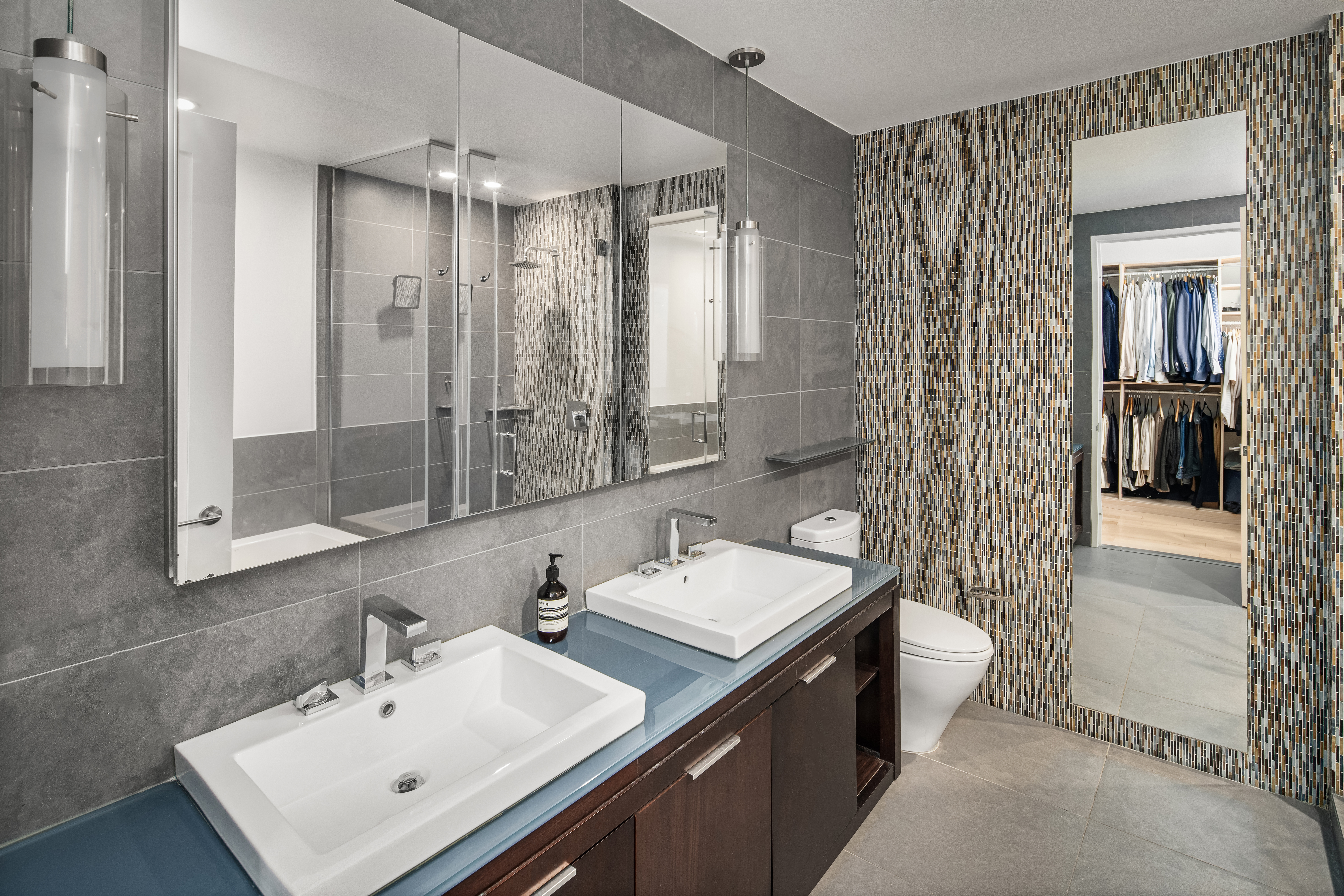 22 North 6th Street, Unit 4S Brooklyn, NY 11249 - Photo 6 of 12 a bathroom with a sink a toilet and shower