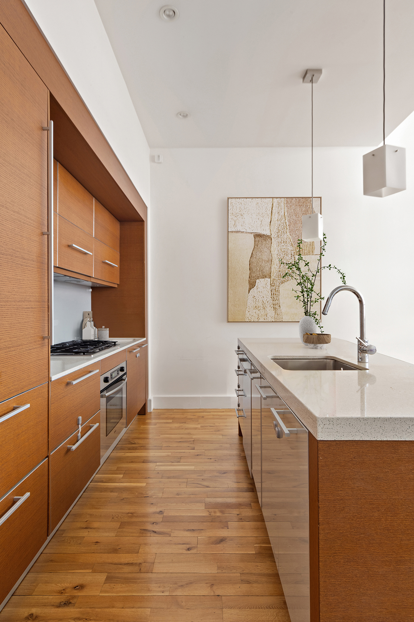 360 Furman Street, Unit 702 Brooklyn, NY 11201 - Photo 5 of 28 a kitchen with a sink and cabinets