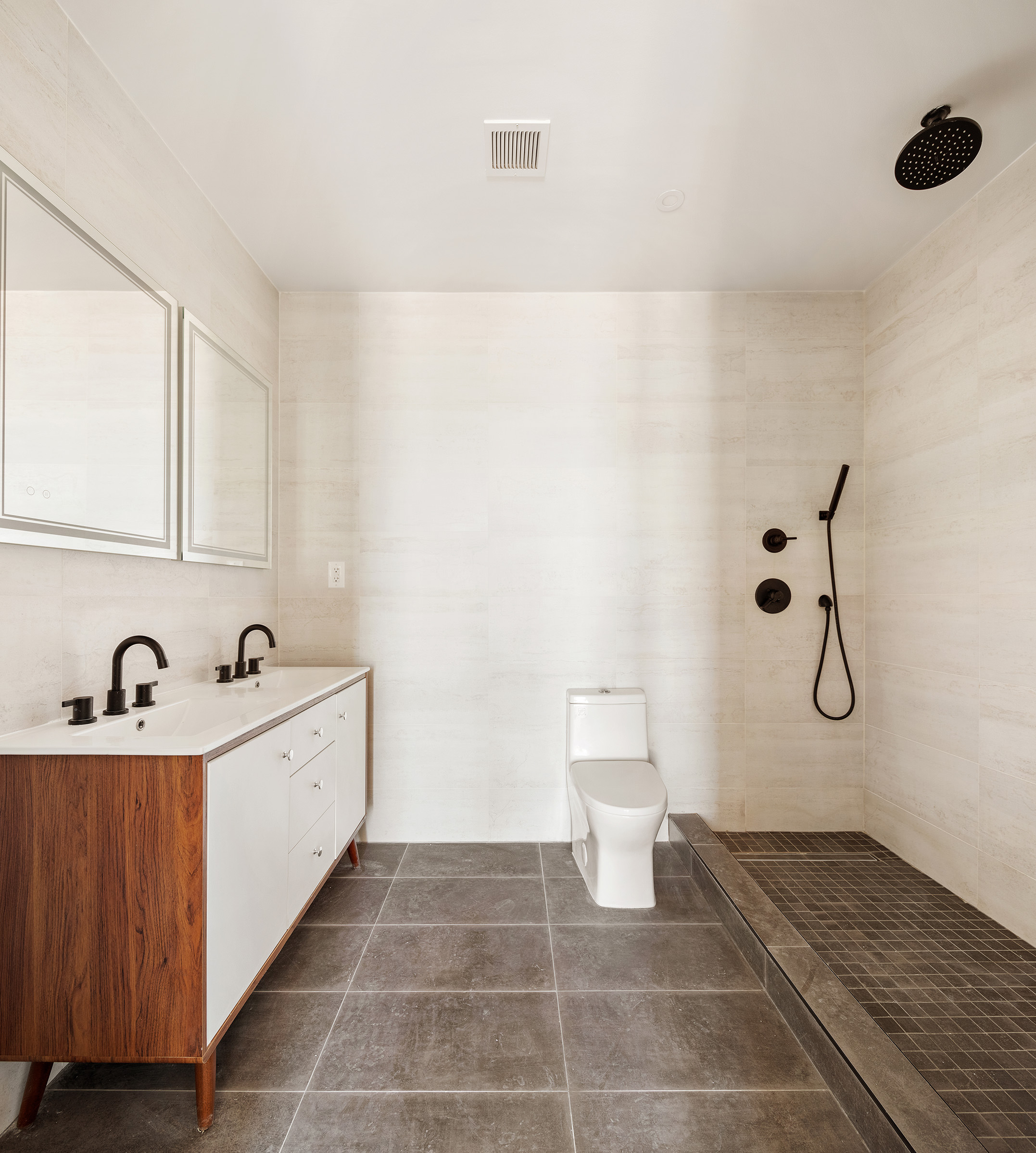 136 14th Street, Unit 3B Brooklyn, NY 11215 - Photo 4 of 8 a bathroom with a sink a toilet and shower