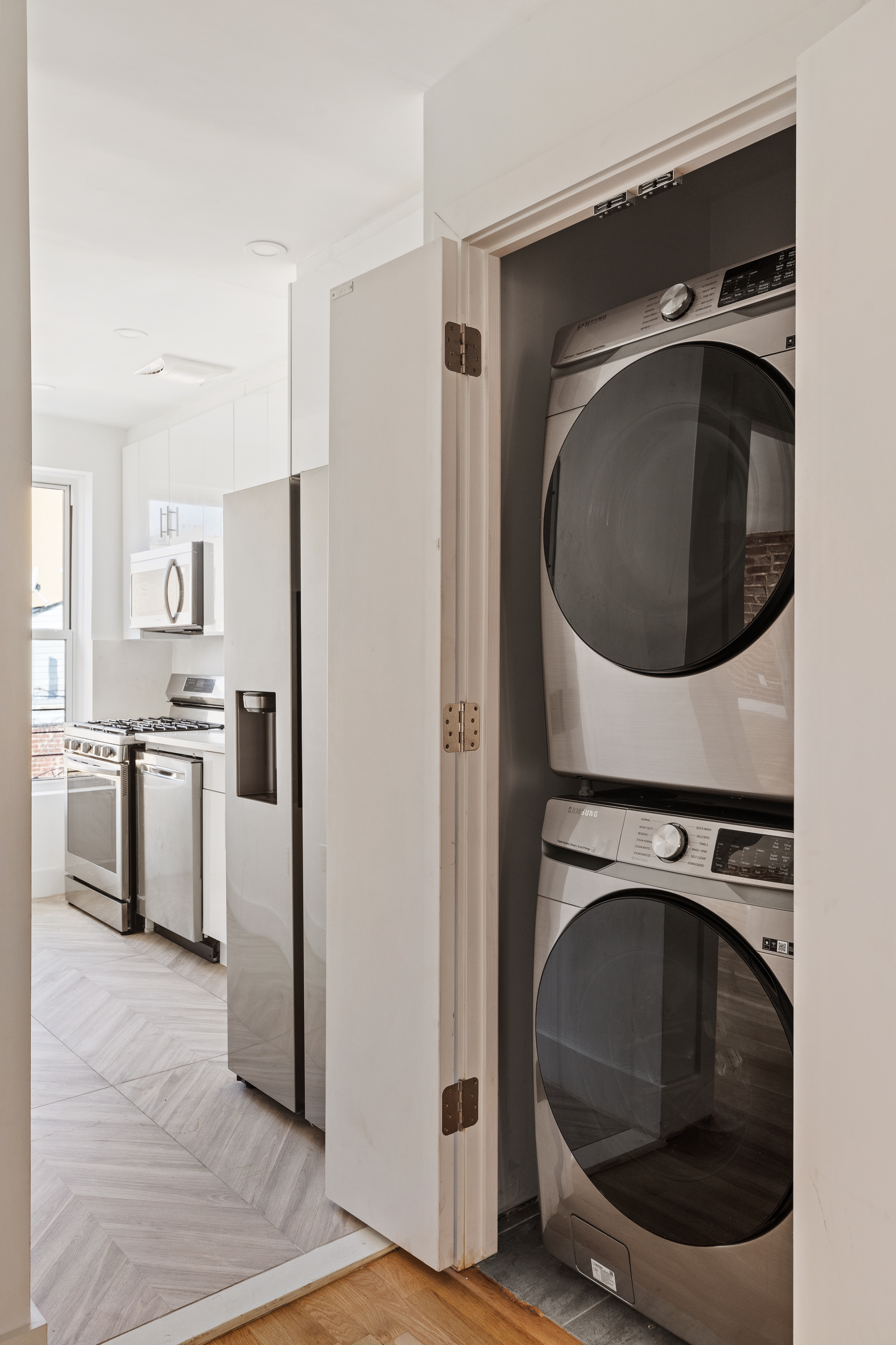 502 5th Avenue, Unit 3 Brooklyn, NY 11215 - Photo 9 of 10 a utility room with sink dryer and washer