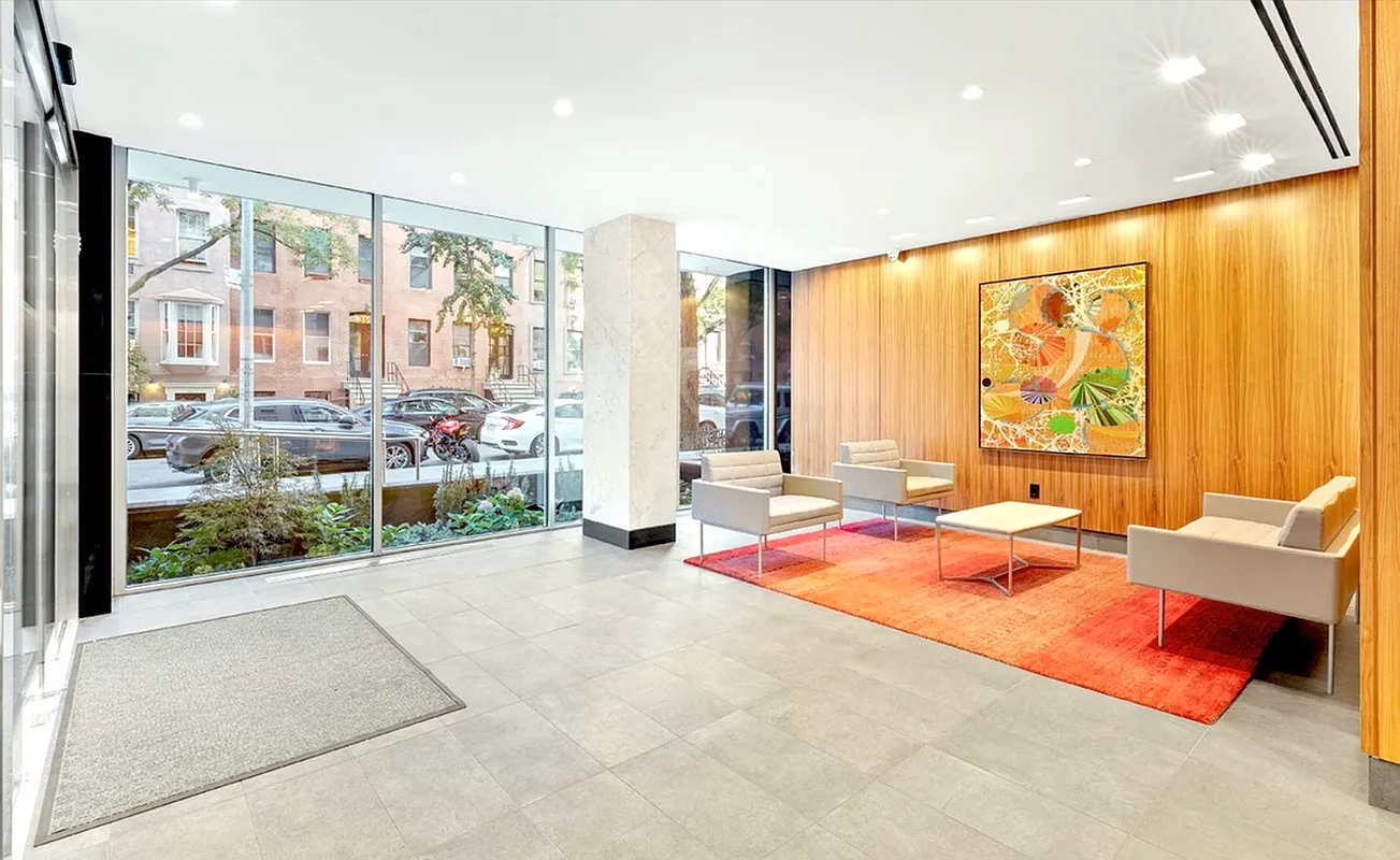 360 West 22nd Street, Unit 12L Manhattan, NY 10011 - Photo 17 of 21 a outdoor space with furniture and large windows