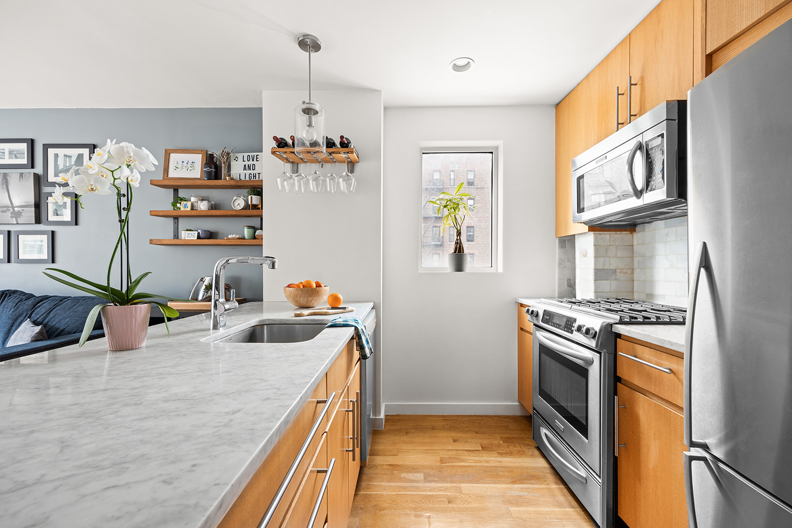 823 Classon Avenue, Unit 4B Brooklyn, NY 11238 - Photo 2 of 17 a kitchen with granite countertop a stove and a sink