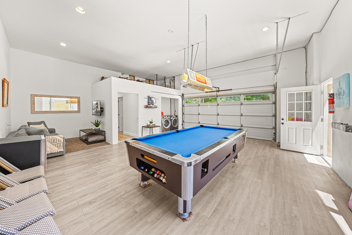 161 Loureyro Road Montecito, CA 93108 - Photo 33 of 52 a room with wooden cabinets and pool table