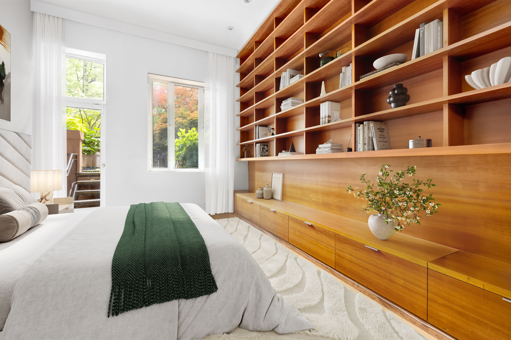 308 East 15th Street, Unit PARLOR Manhattan, NY 10003 - Photo 11 of 16 a spacious bedroom with a bed and a window