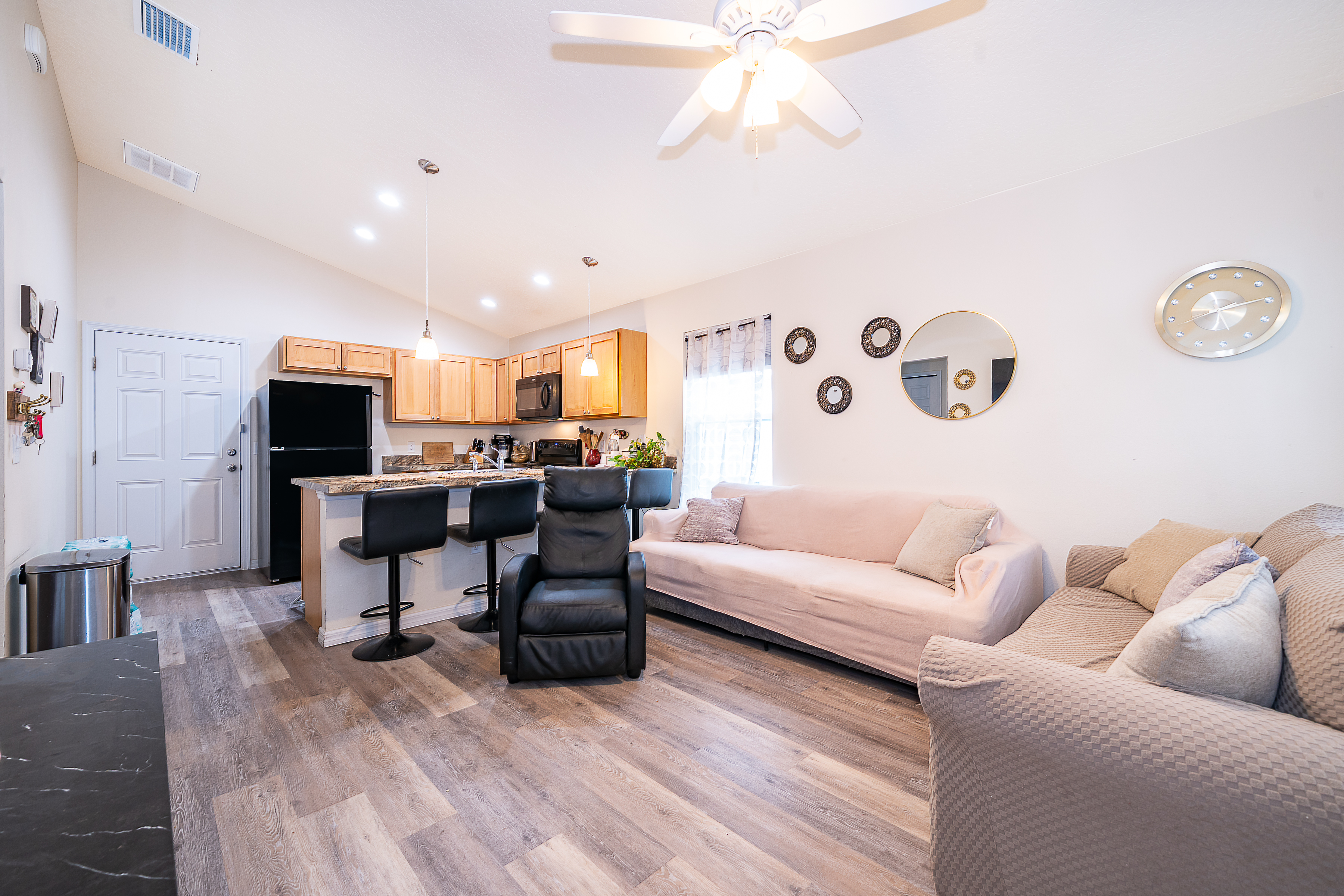 1360 Cottage Circle Tavares, FL 32778 - Photo 6 of 25 a living room with furniture and a flat screen tv