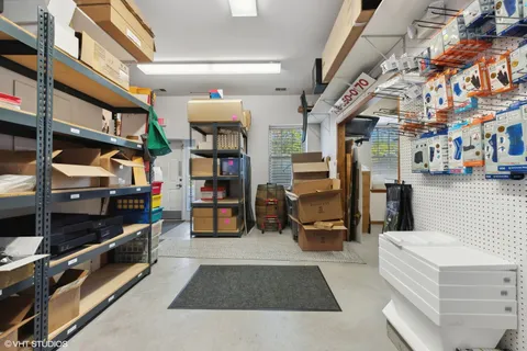 a living room with lots of furniture and a rug