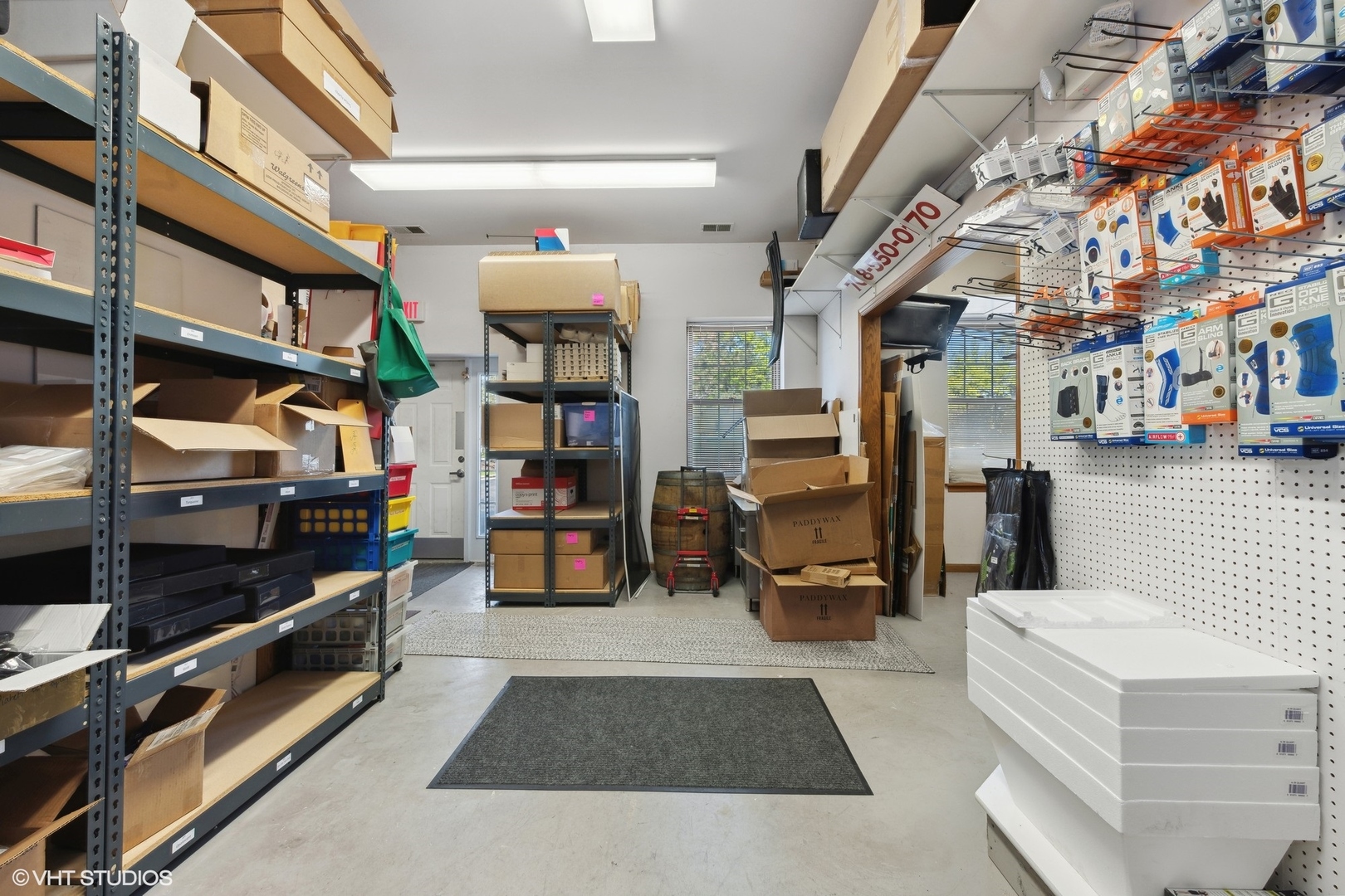 280 North Rand Road Lake Zurich, IL 60047 - Photo 15 of 28 a living room with lots of furniture and a rug