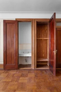 a view of room with walk in closet and window