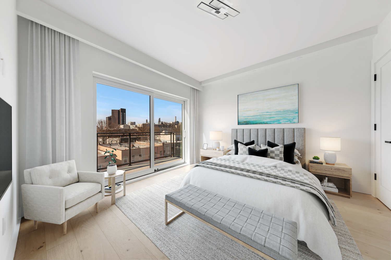 12-16 30th Avenue, Unit 303 Queens, NY 11102 - Photo 5 of 18 a bedroom with a bed couch and window
