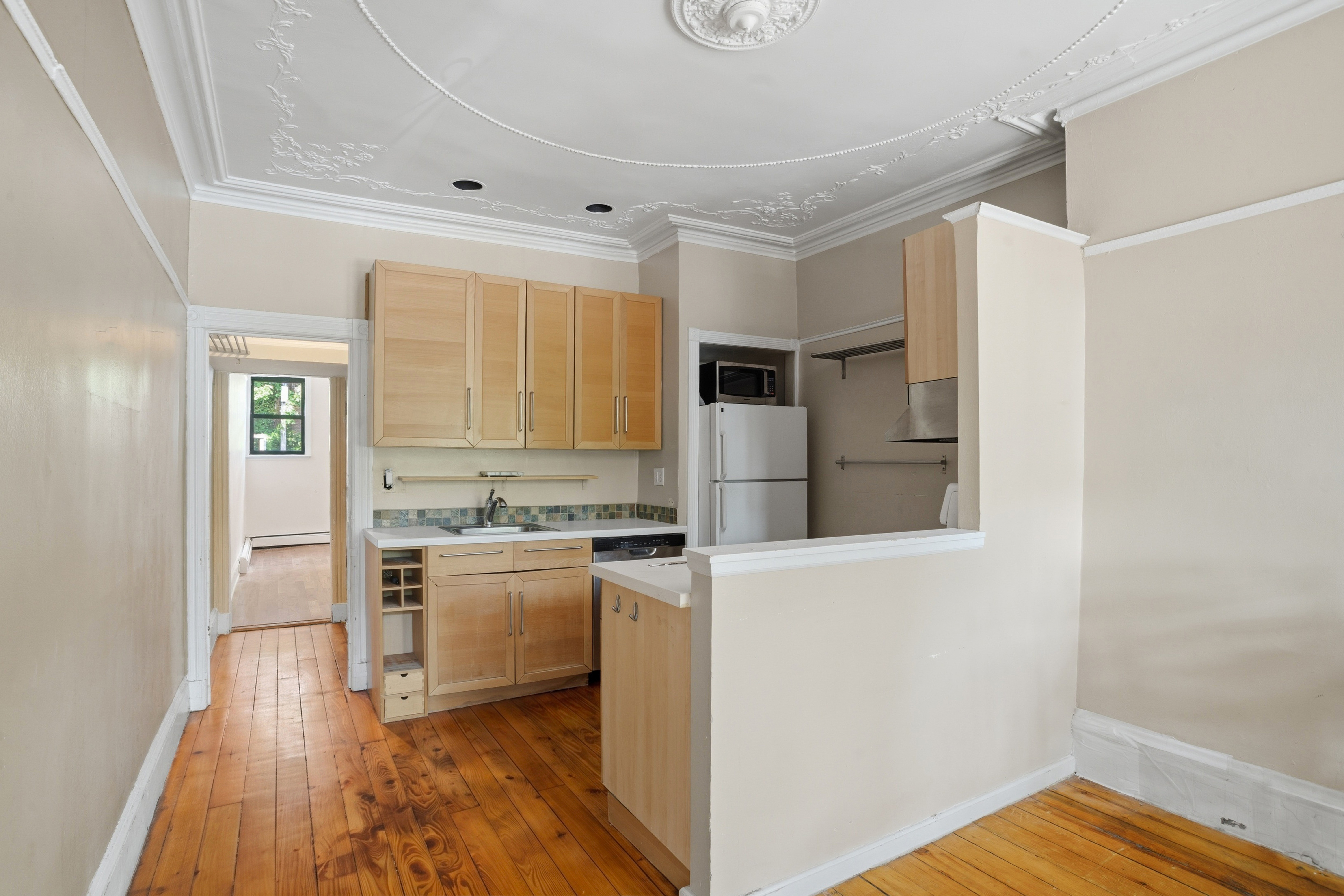 417 A 18th Street Brooklyn, NY 11215 - Photo 3 of 16 a kitchen with a stove a refrigerator and a oven
