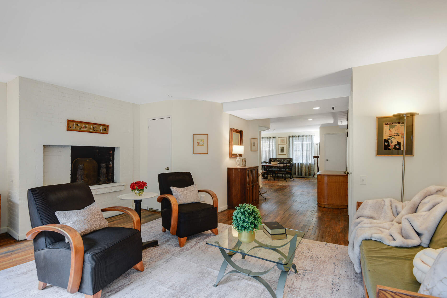 217 West 15th Street Manhattan, NY 10011 - Photo 7 of 21 a living room with furniture and a table
