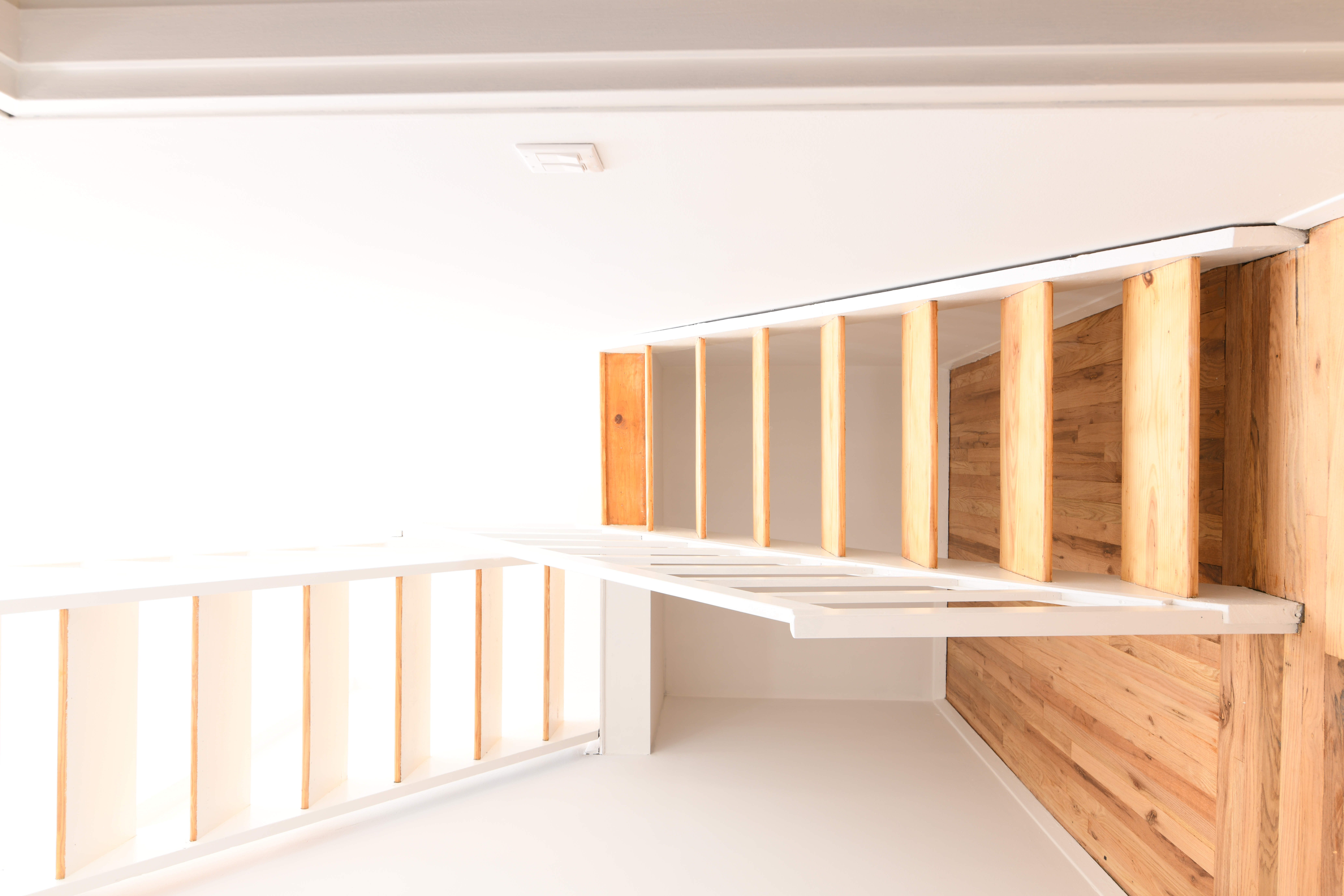 303 Mercer Street, Unit A601 Manhattan, NY 10003 - Photo 9 of 19 a view of staircase with white walls