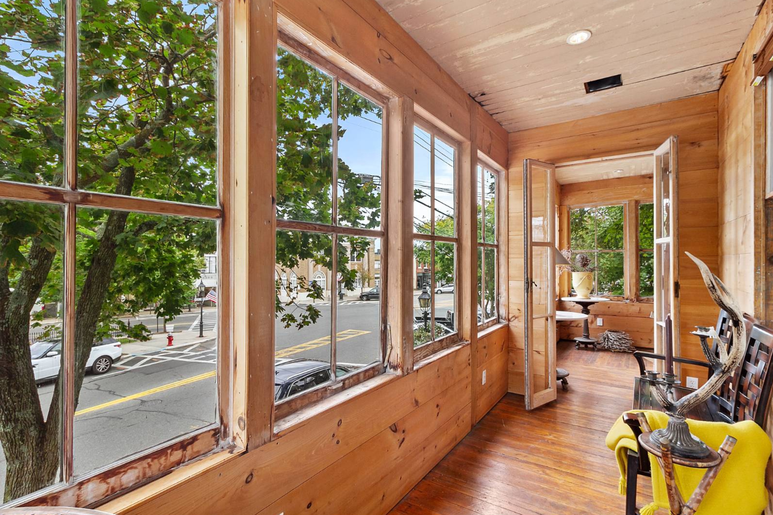 3 Madison Street Sag Harbor, NY 11963 - Photo 7 of 7 a view of an entryway with wooden floor and windows
