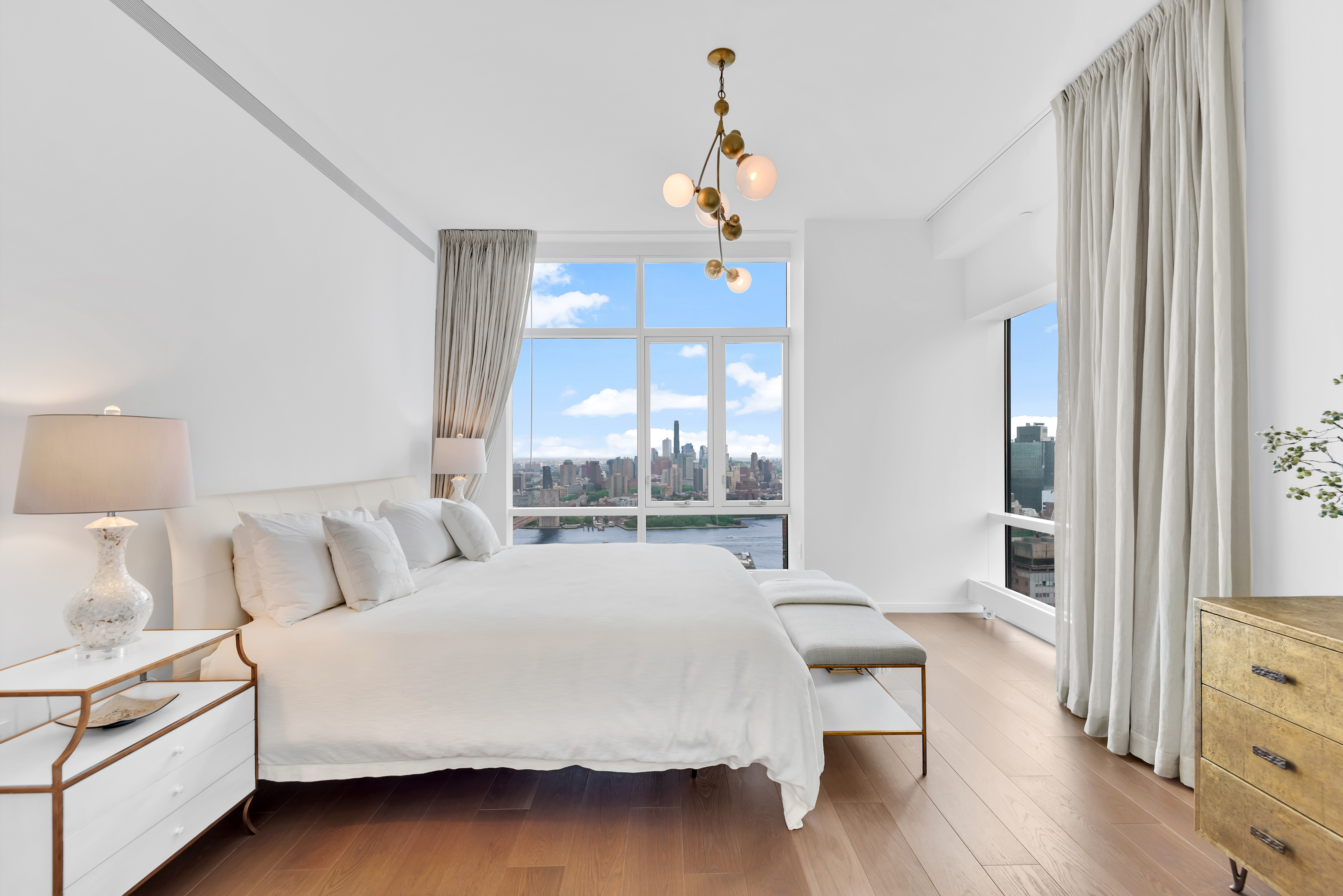 5 Beekman Street, Unit 48B Manhattan, NY 10038 - Photo 5 of 17 a bedroom with a bed and a window