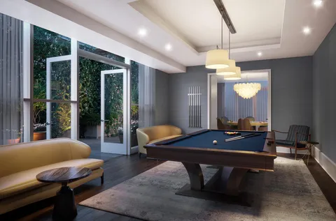 a room with furniture and a chandelier