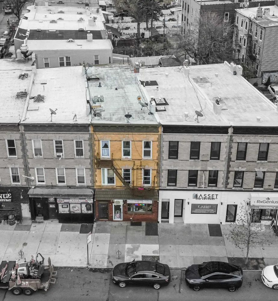 a car parked in front of a building