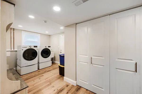 a utility room with dryer and washer