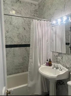a bathroom with a sink and a bathtub