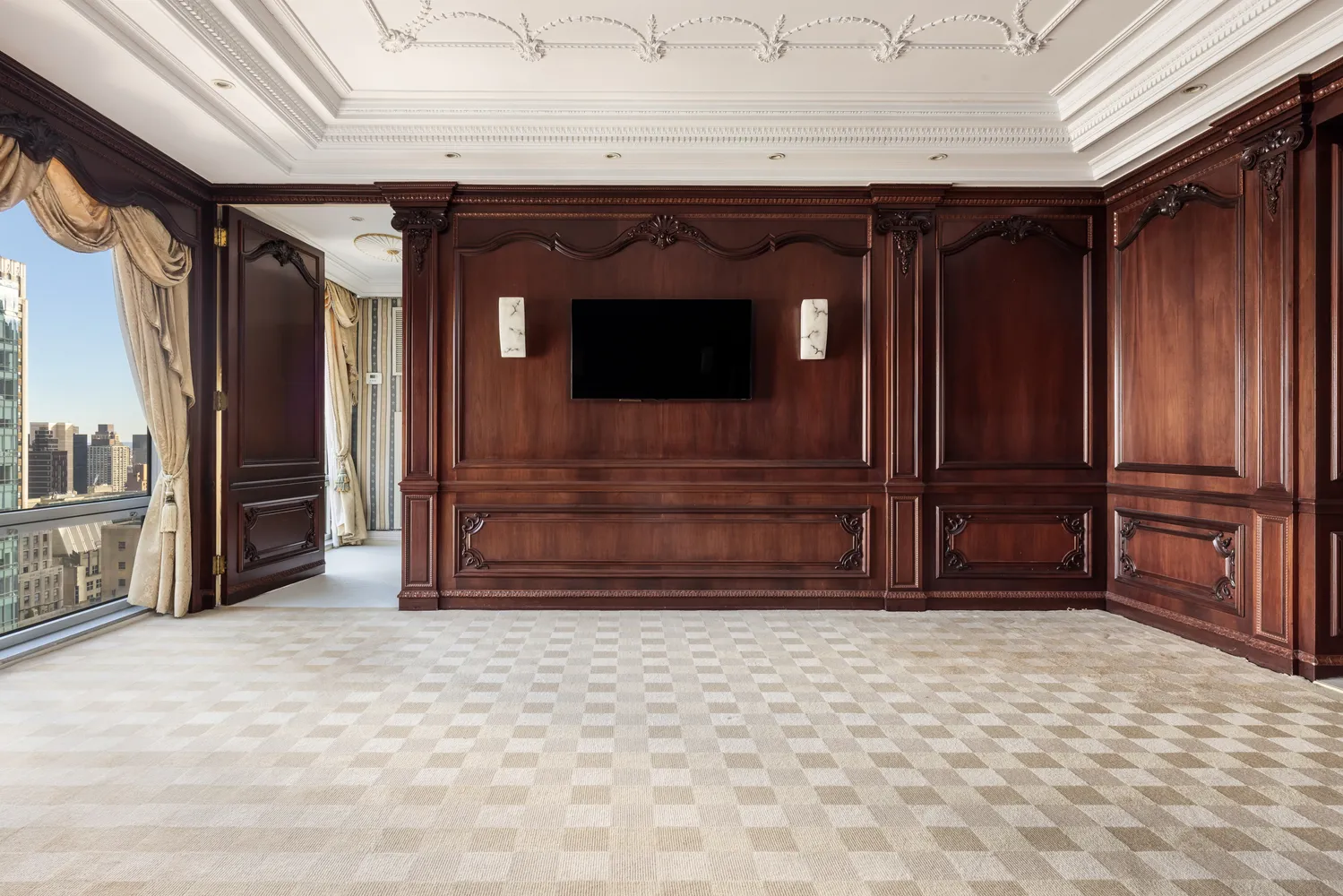 a view of an empty room with a window