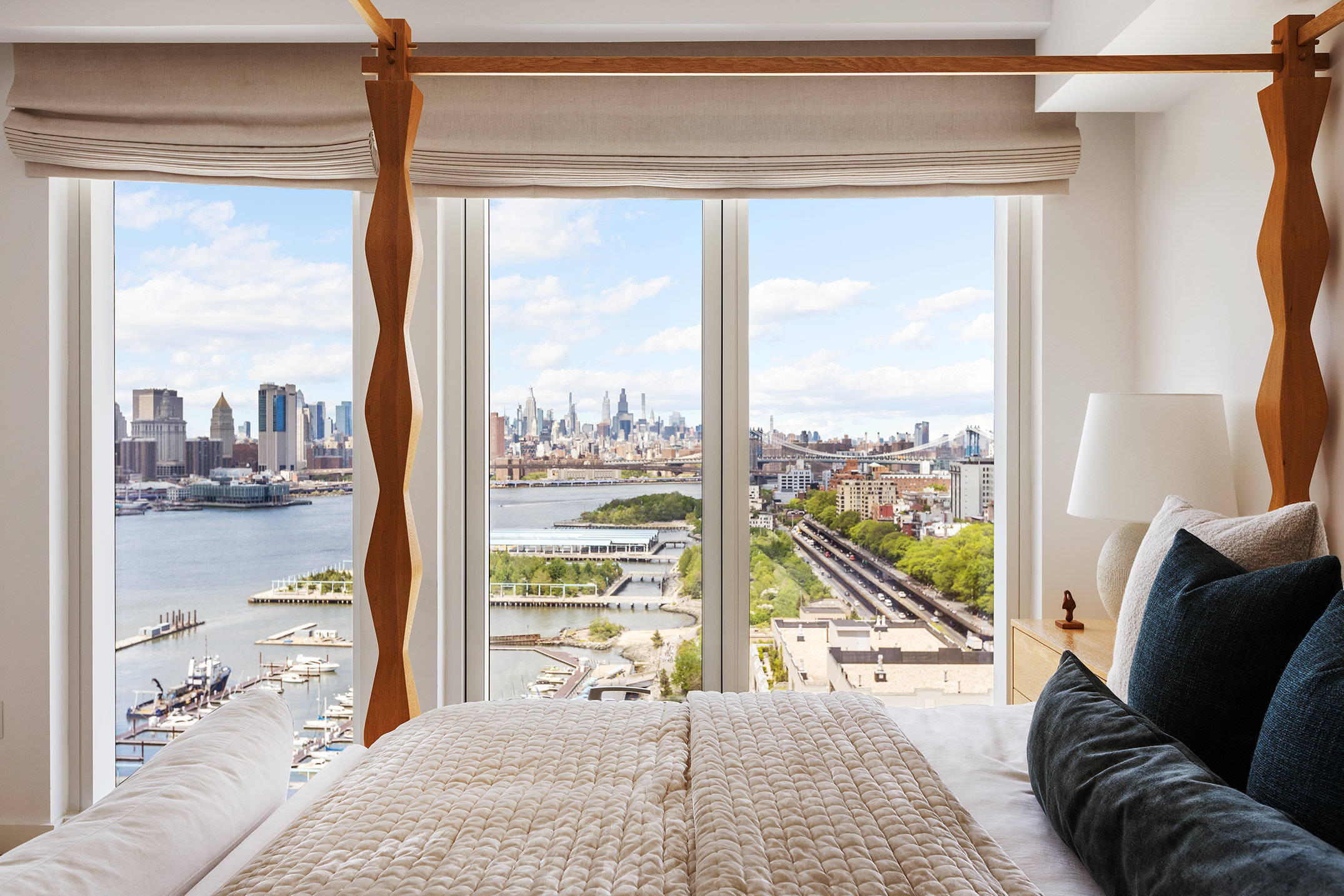 50 Bridge Park Drive, Unit 26A Brooklyn, NY 11201 - Photo 20 of 29 a living room with couch and a floor to ceiling window