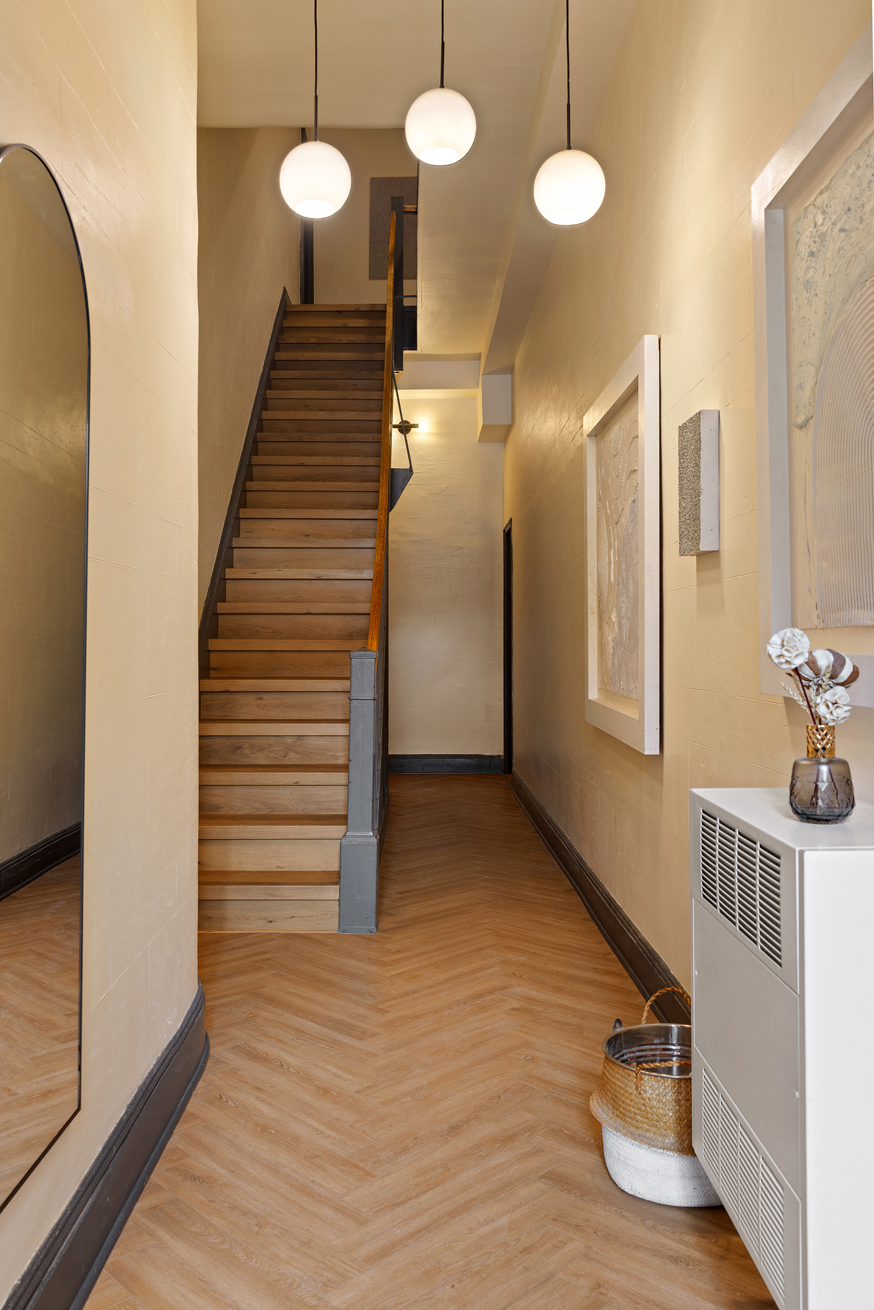 151 Grand Street, Unit 8 Brooklyn, NY 11249 - Photo 18 of 20 a view of a hallway with wooden floor and staircase