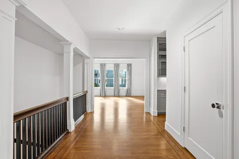 a view of entryway with wooden floor