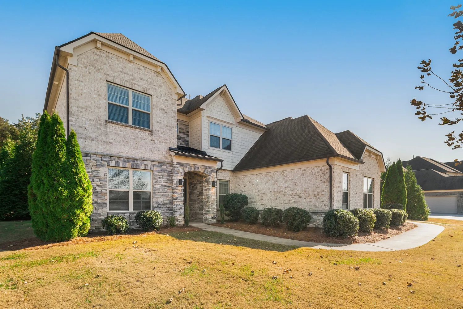 a view of a hallway view with wooden floor and living room