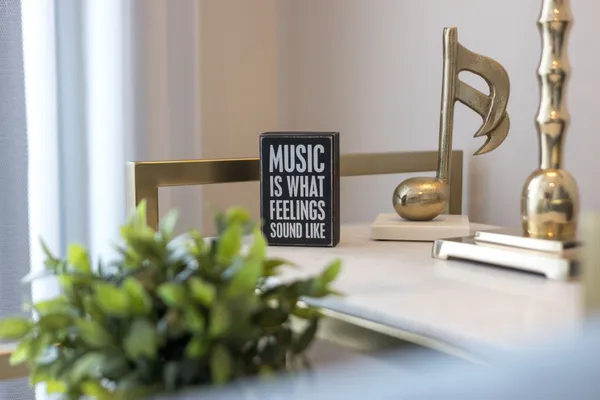a dining room with furniture and a window