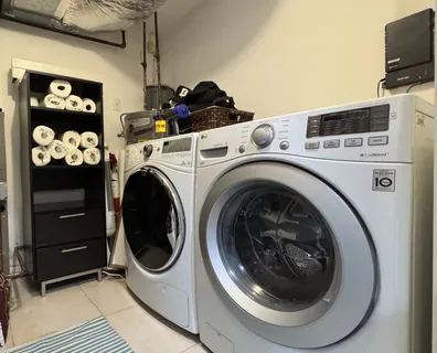 a utility room with dryer and washer