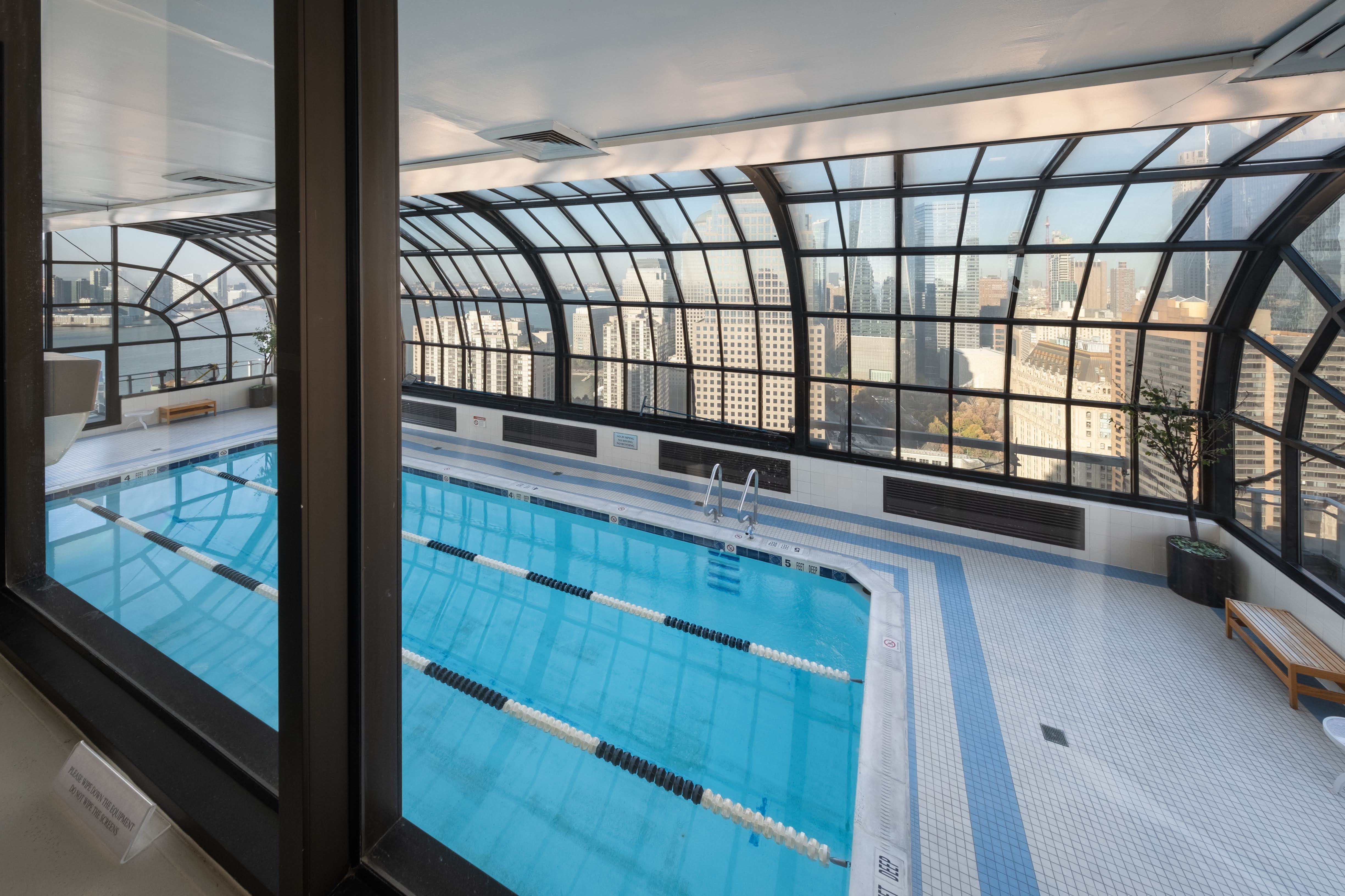 200 Rector Place, Unit 16F Manhattan, NY 10280 - Photo 14 of 25 a view of a living room and a balcony
