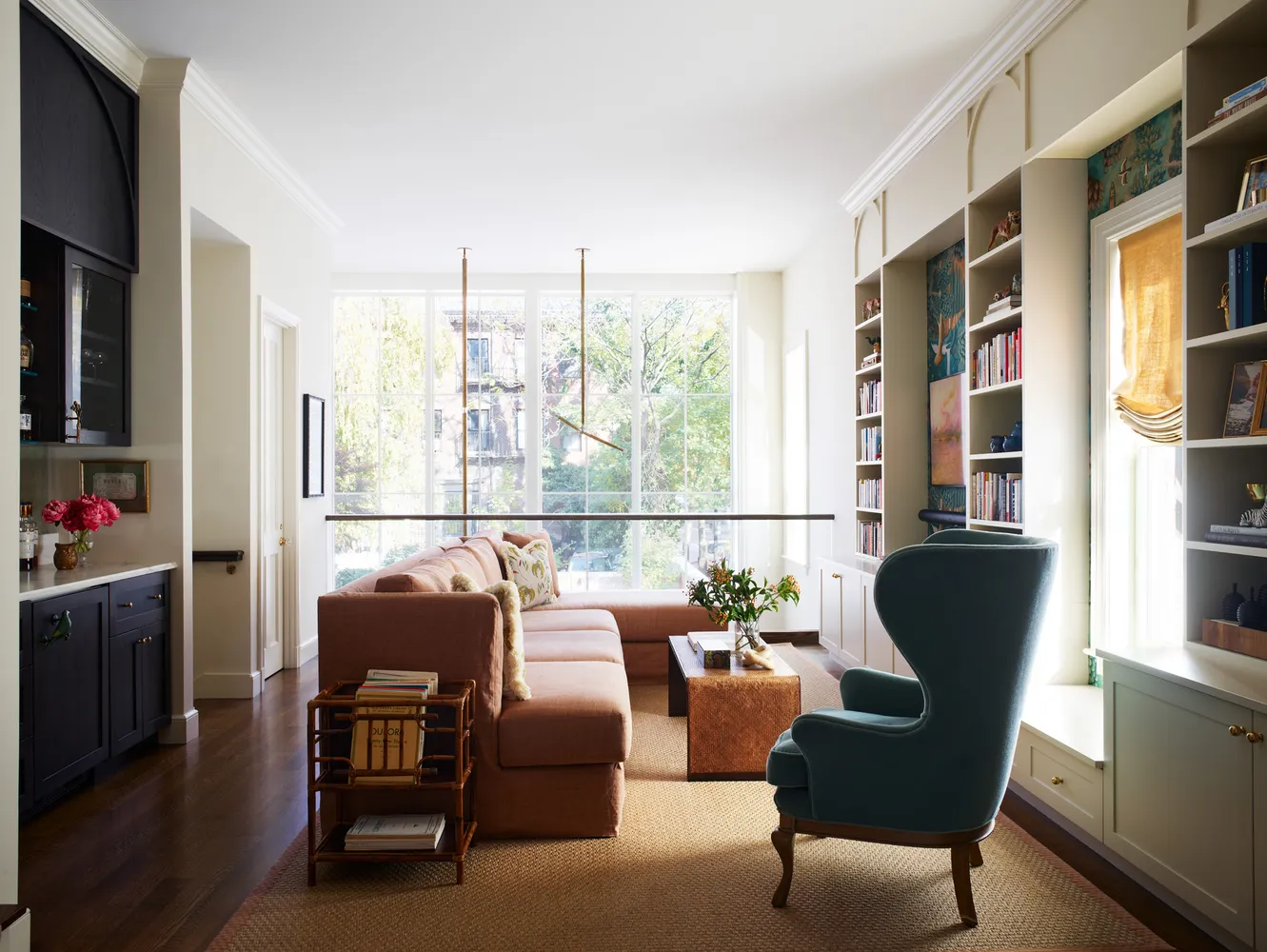 a living room with furniture and a window