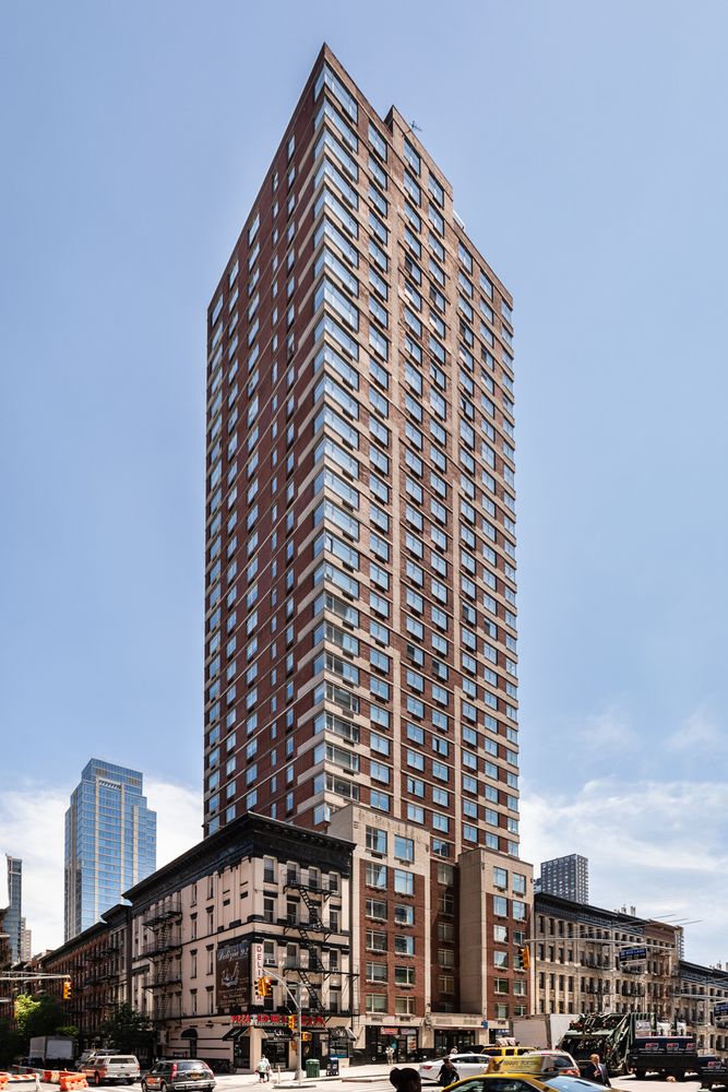 1760 2nd Avenue, Unit 30C Manhattan, NY 10128 - Photo 18 of 21 a front view of a building