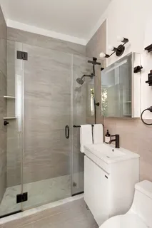 a bathroom with a sink and mirror